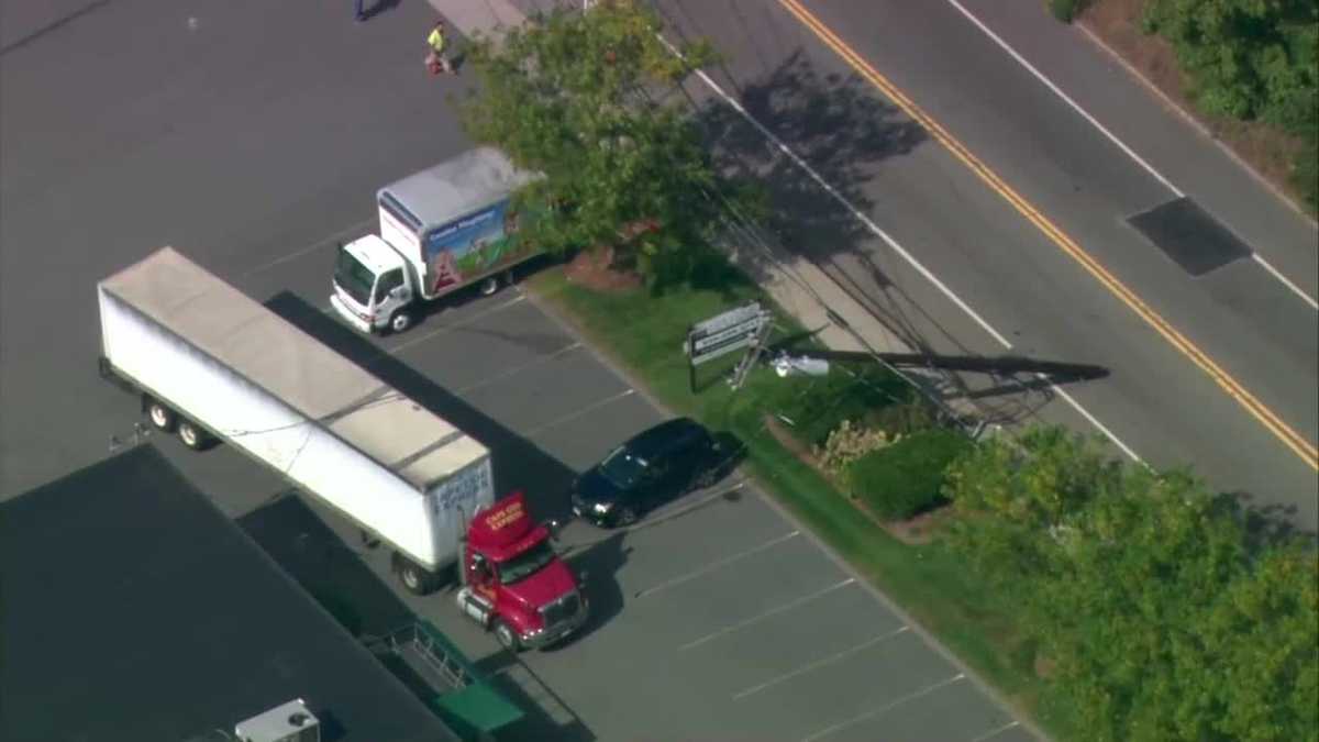 Road closed after truck takes down utility pole