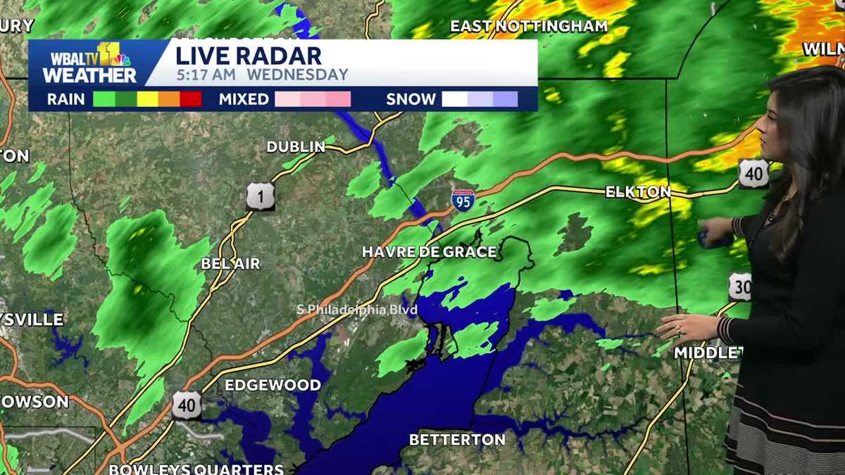 Morning rain and fog clears with clouds lingering this afternoon