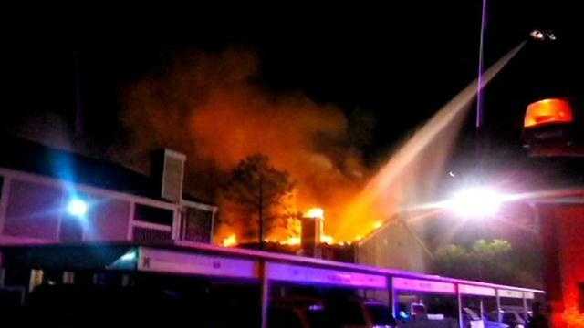 Apartment fire displaces dozens of residents