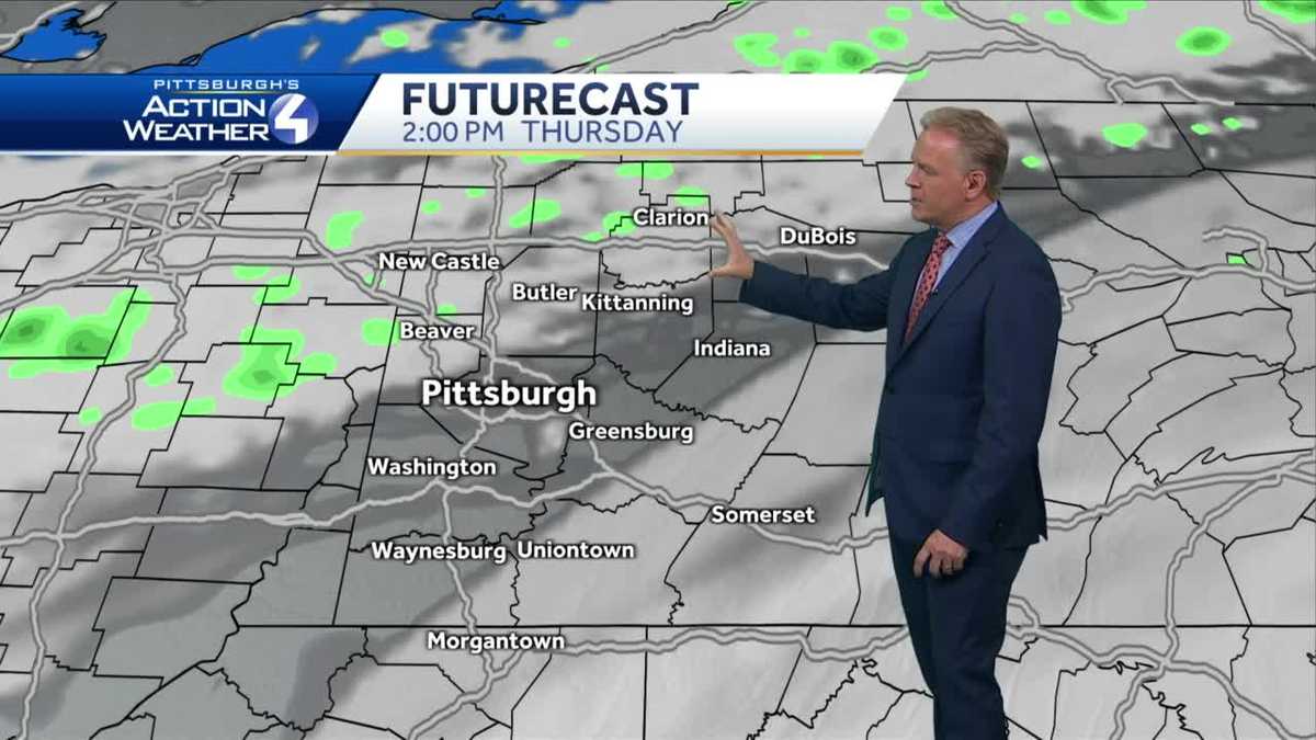 Mostly cloudy with isolated showers on Thursday