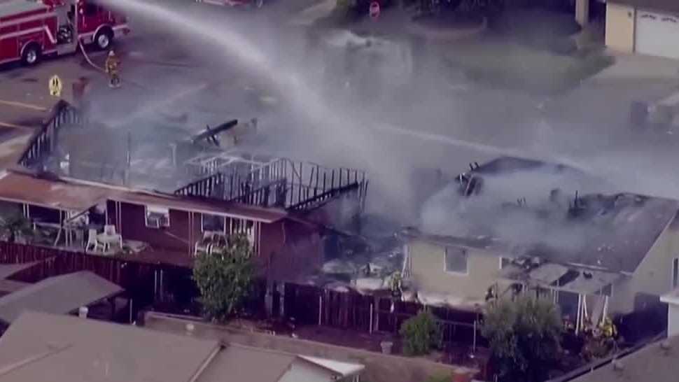 At least 2 dead, homes burn after plane crashes in California neighborhood