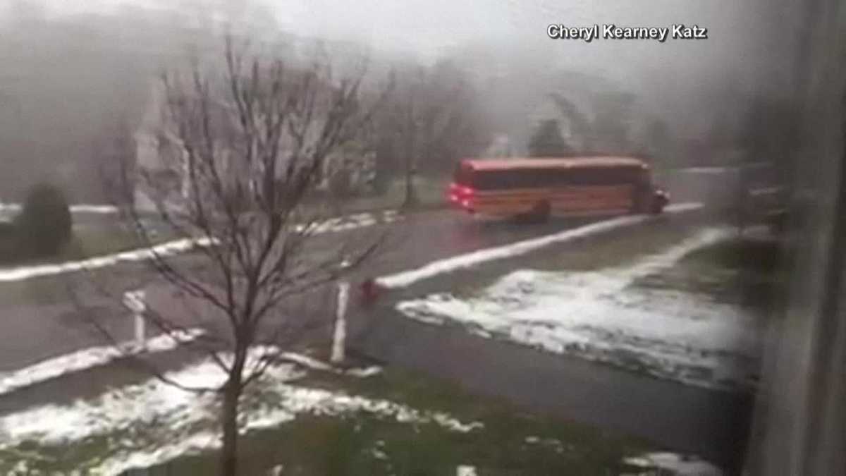 School bus full of children slides down icy New England street