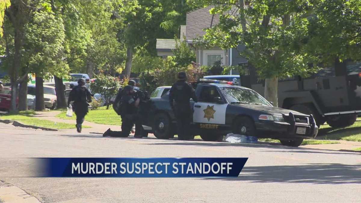 Stockton standoff continues with homicide suspect