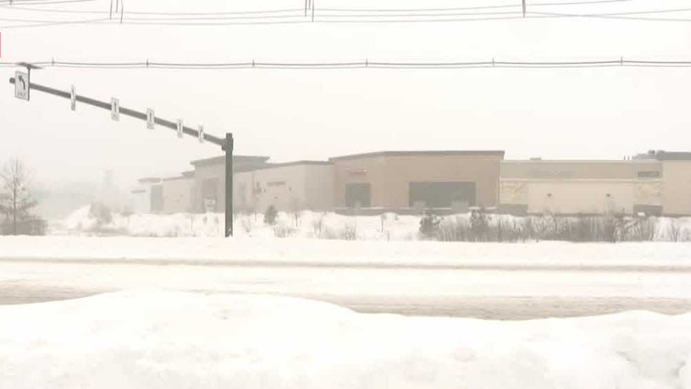 Gusty winds as snow continues to fall across southern New Hampshire