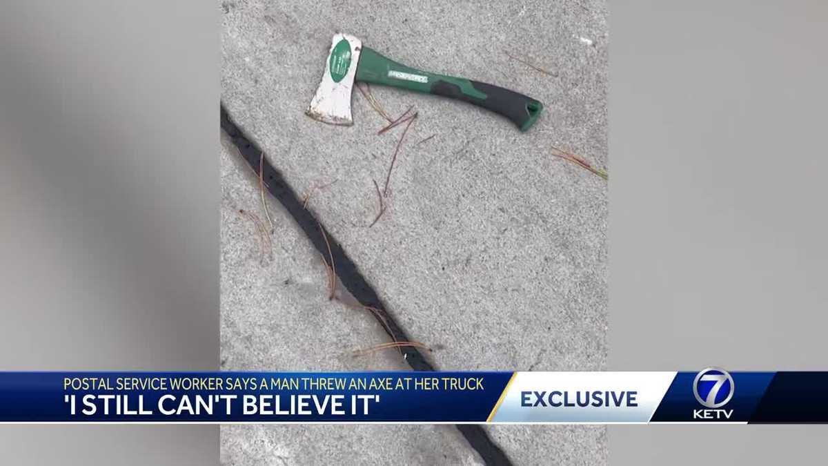 Man throws axe at Omaha postal service truck driver
