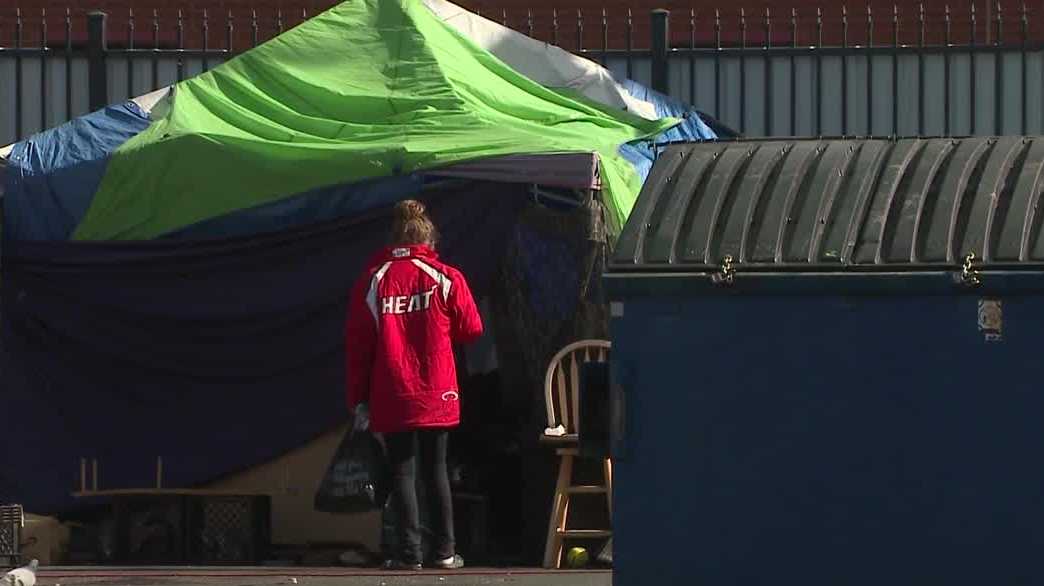 City takes legal action against bookstore because of homeless encampment