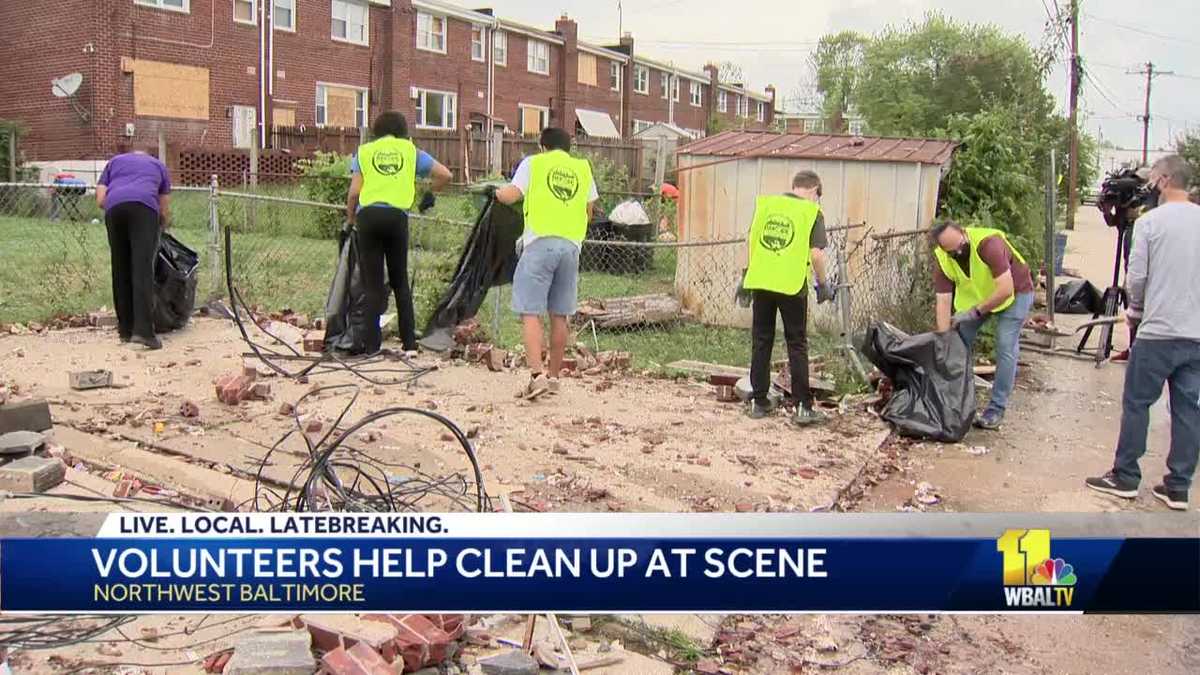 Volunteers clean up Baltimore neighborhood rocked by explosion
