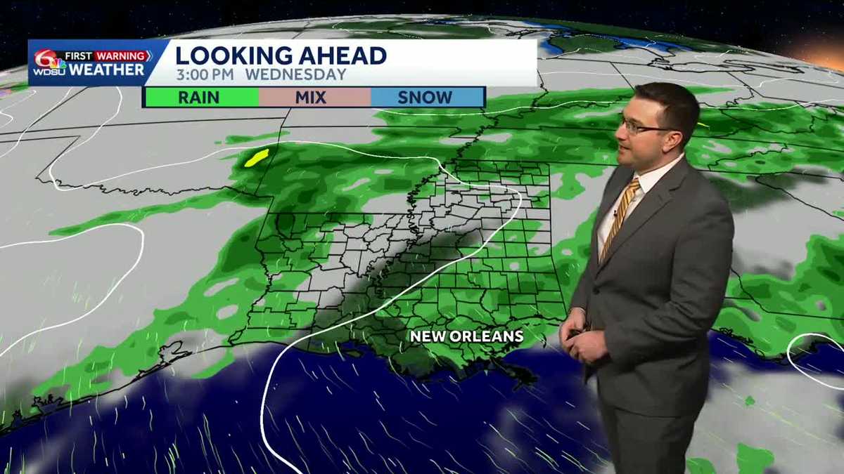 Cooler and breezy with a slight chance of showers Sunday