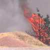 Grass fire along Sooner Road in OKC burns near structures, causes heavy smoke