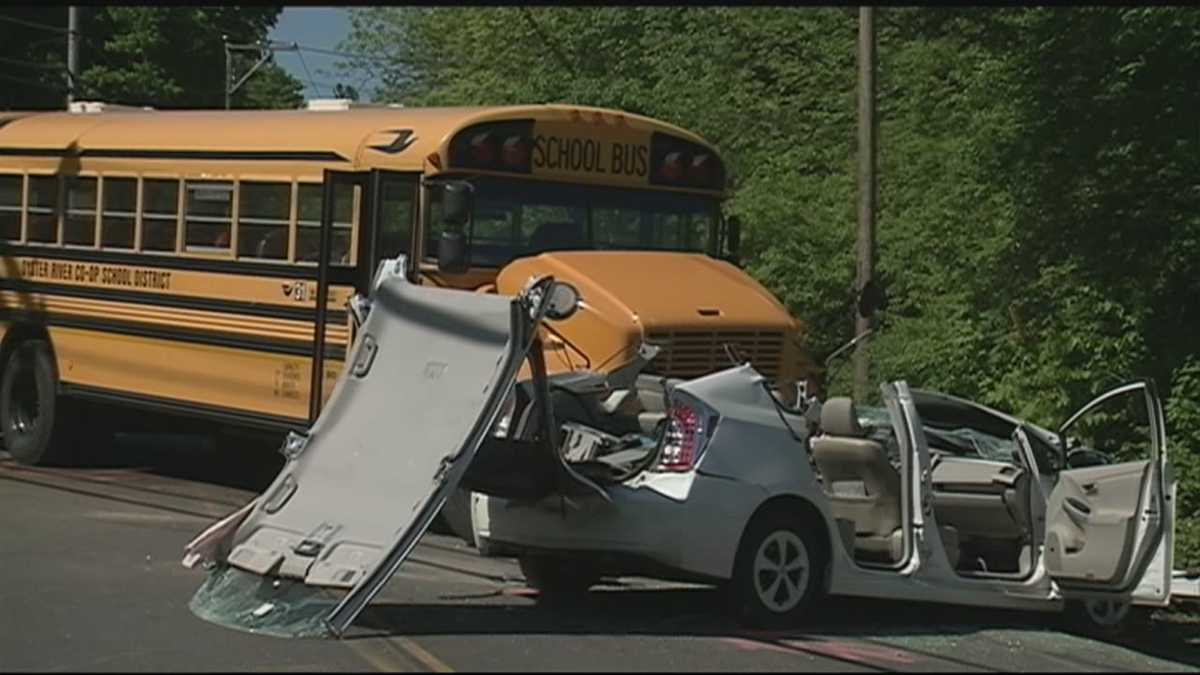 Car driver injured in crash with school bus