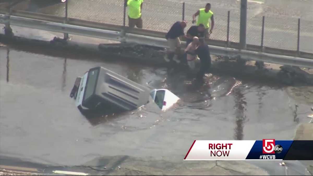 'It just looked like a puddle,' driver rescued from submerged truck says