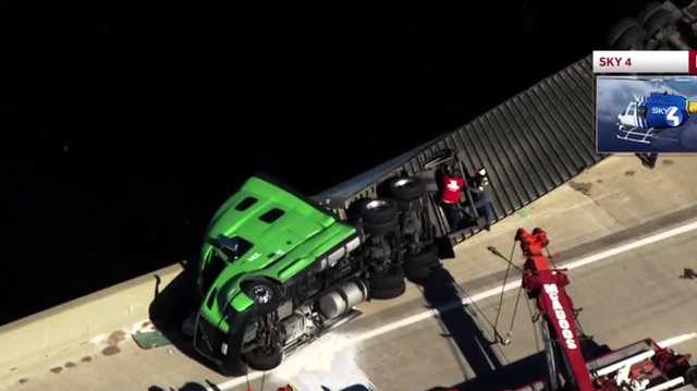 Interstate 70 westbound closed as semi-truck dangles on off-ramp - Vimarsana News