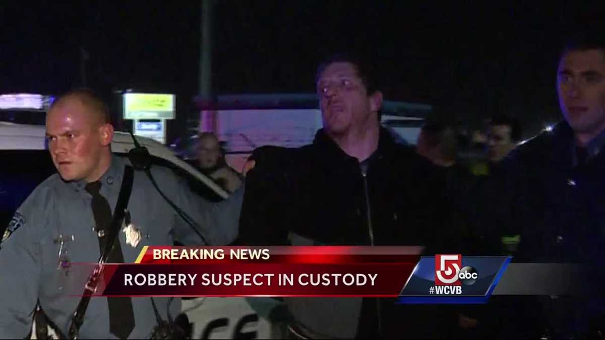 Robbery suspect in custody after crashing into pool