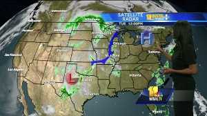 Warm with isolated showers possible Tuesday