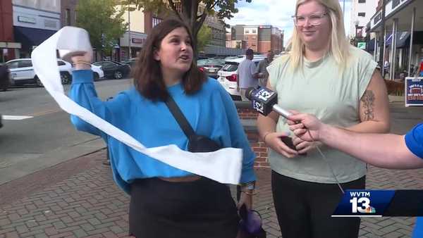 Woman pretending to throw toilet paper