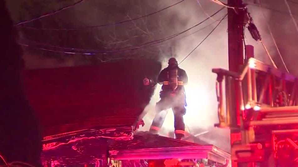 Two people hospitalized, one firefighter injured in house fire
