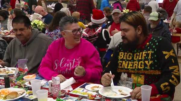 'this is about community': perry celebrates 20 years of christmas dinner