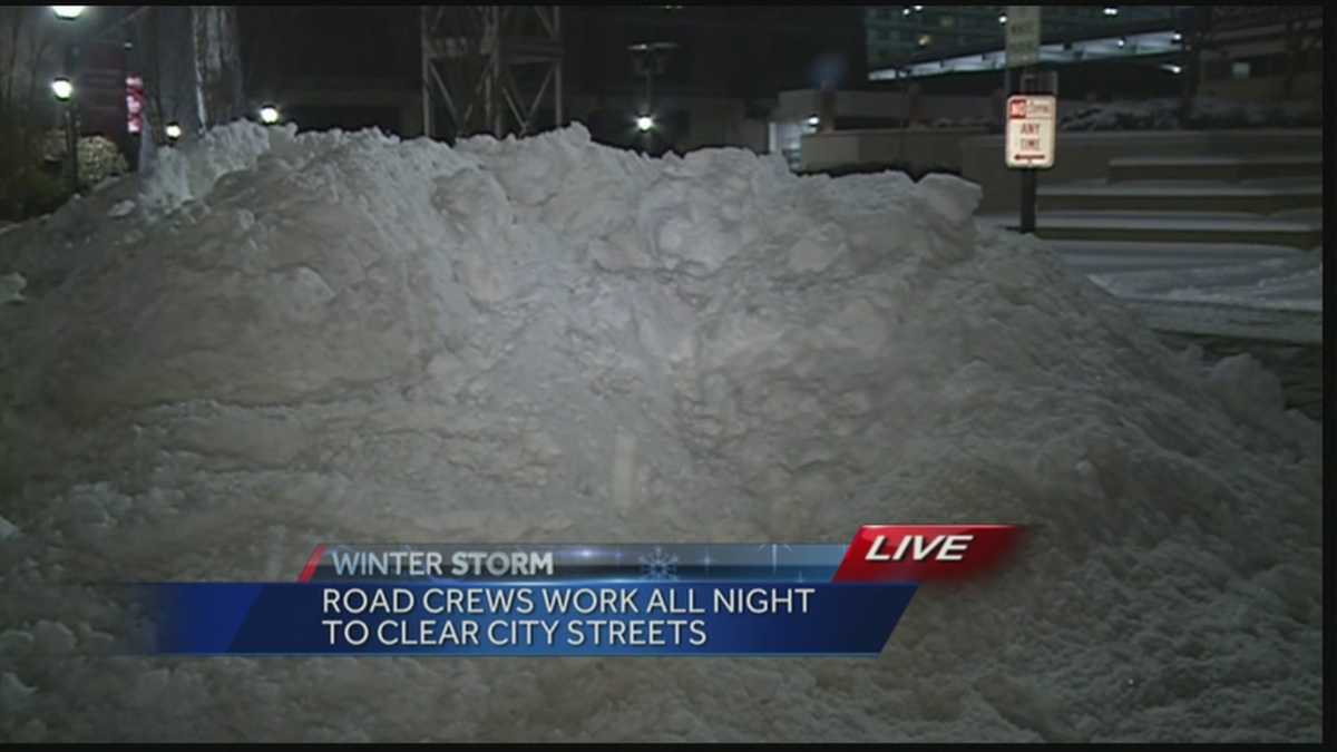 Road crews work all night to clear city streets