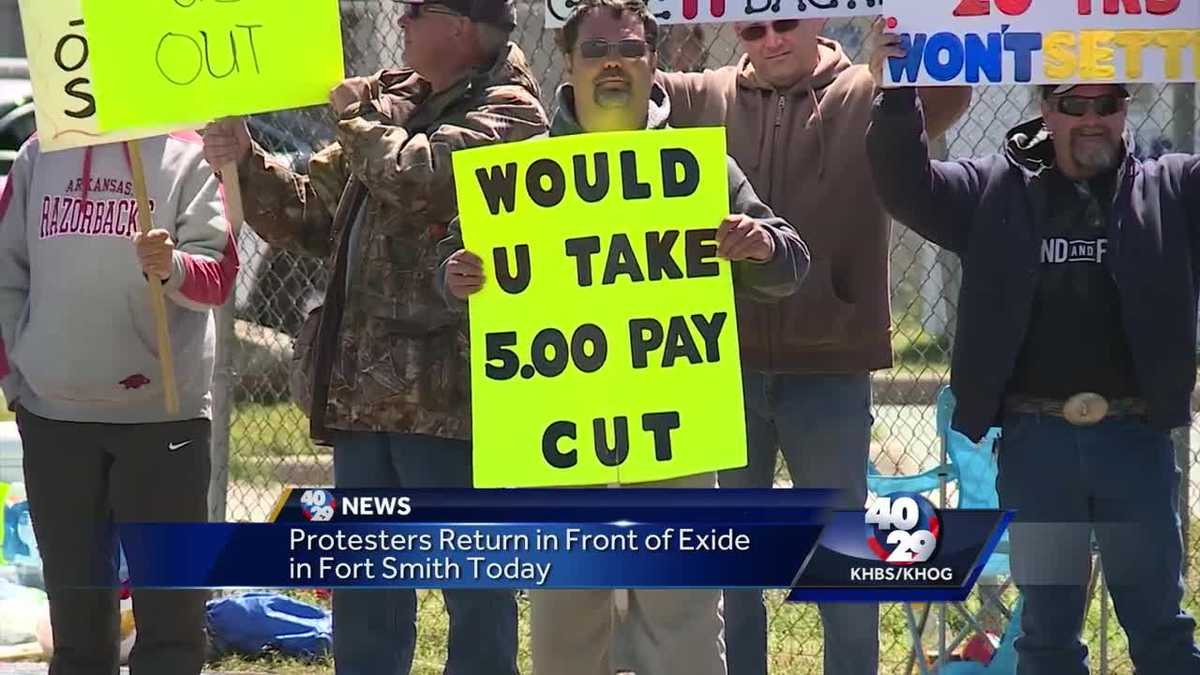 Exide Plant workers picket outside building