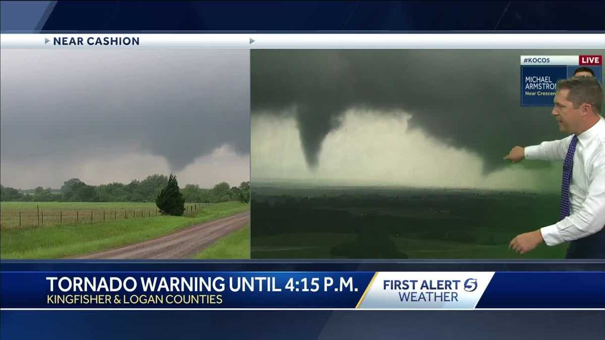 Watch Twin tornadoes on the ground in Logan County