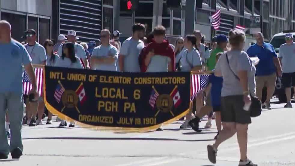 Steelworkers, firefighters and police march in downtown Pittsburgh Labor Day celebration