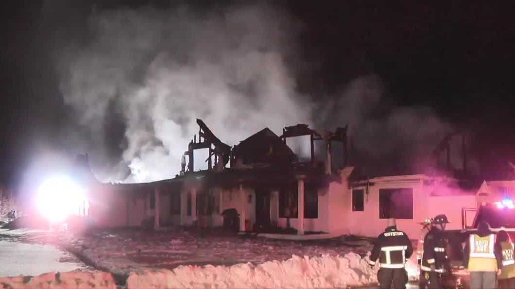 Firefighter hurt, dozens of crews respond to New Boston house fire