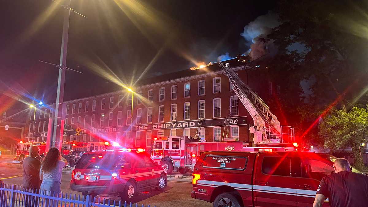 Crews battle 2-alarm fire at Shipyard building in Canton