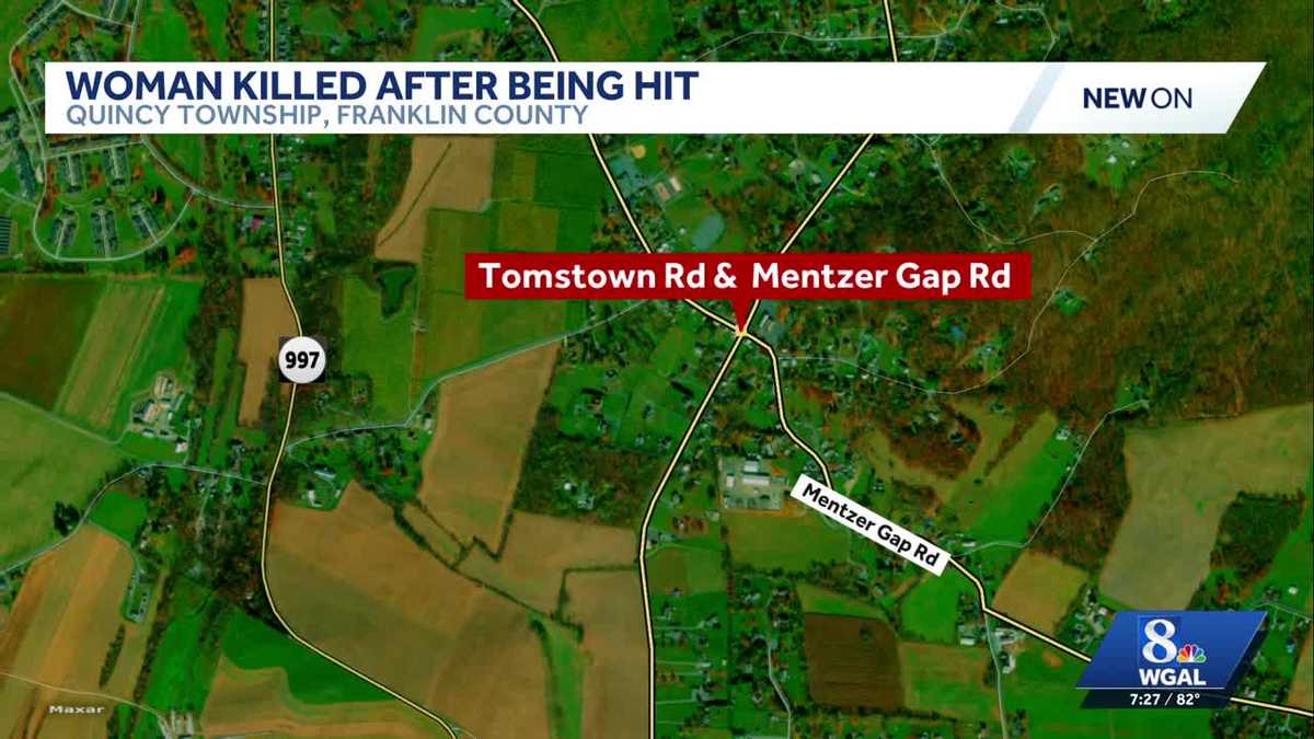 Woman standing next to road killed after vehicles collide at intersection