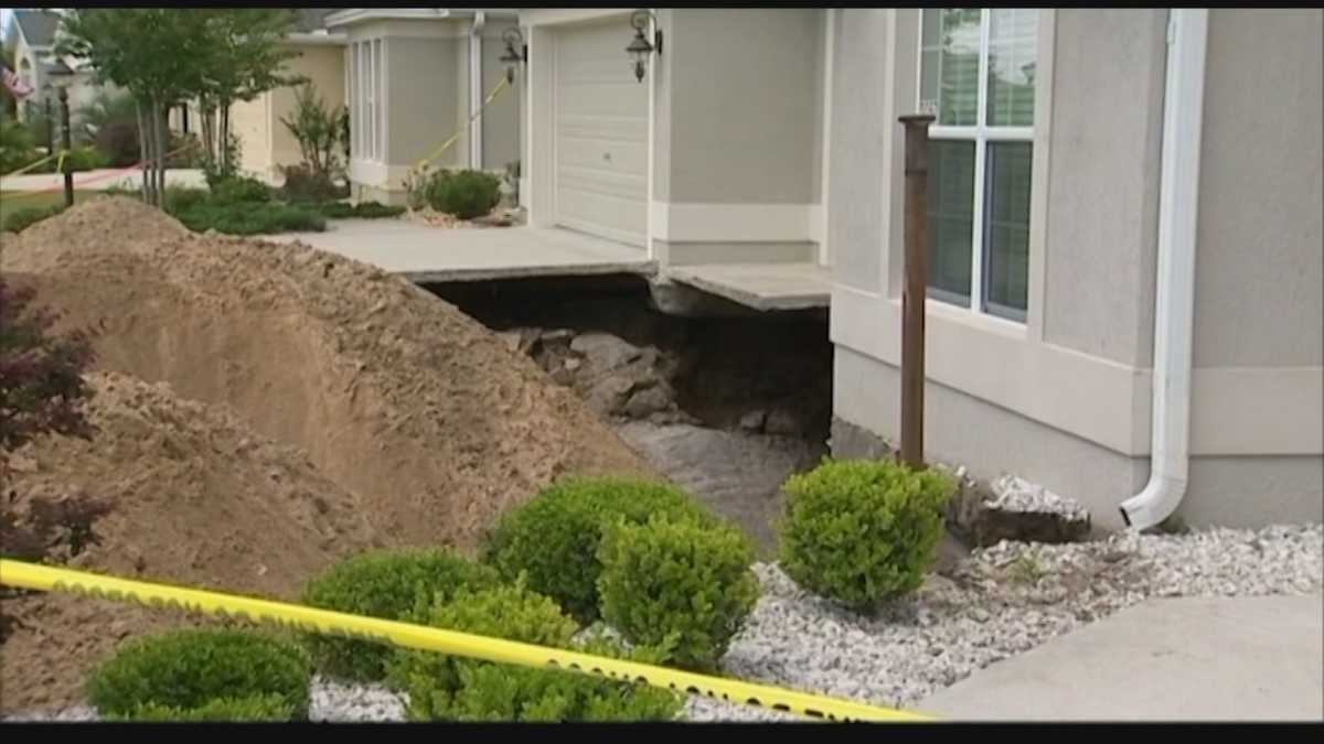 Villages sinkhole re-opens, being filled a second time