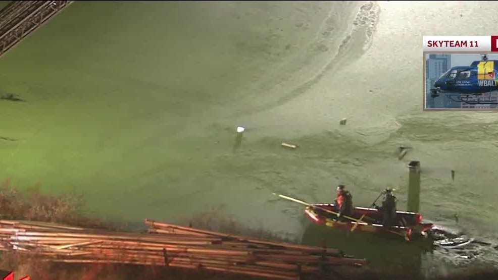 Rescue crews search for driver after car submerged in pond