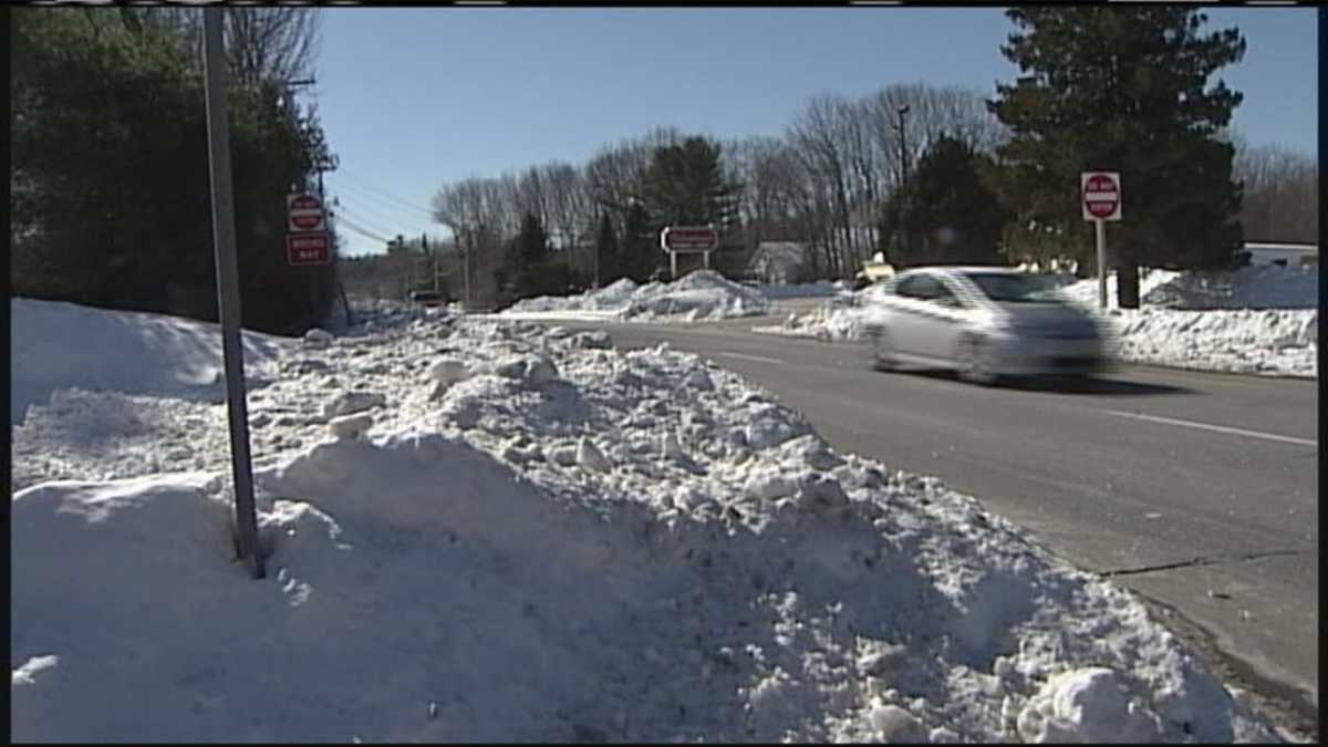 High snow banks causing big problems for drivers