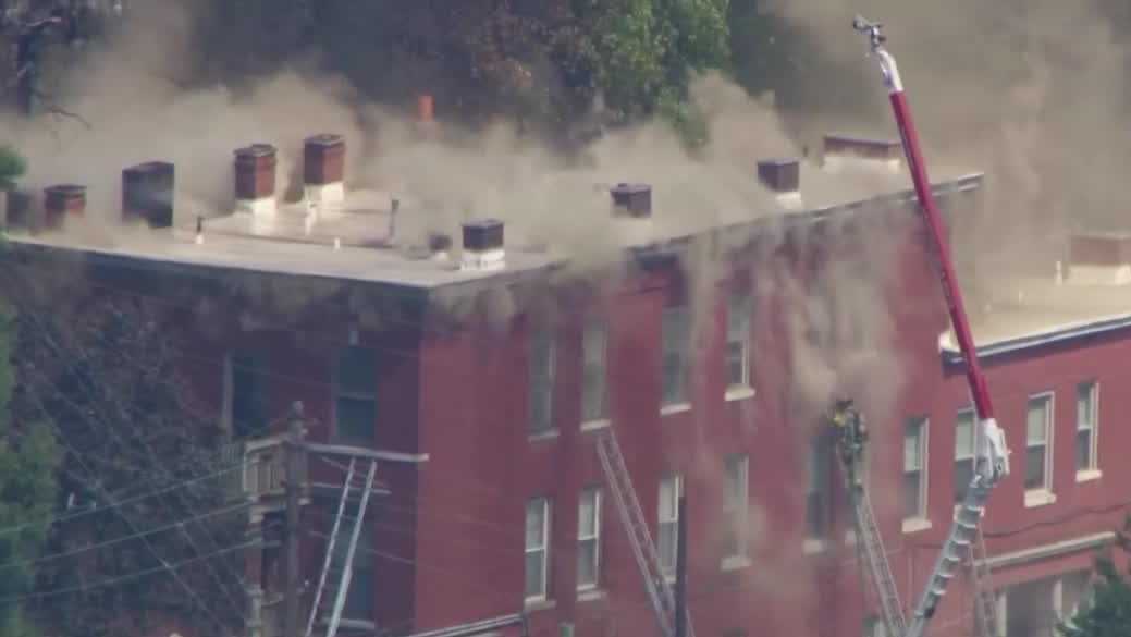 'Covered in smoke': Neighbors watch in disbelief as fire spreads across buildings in Old Louisville