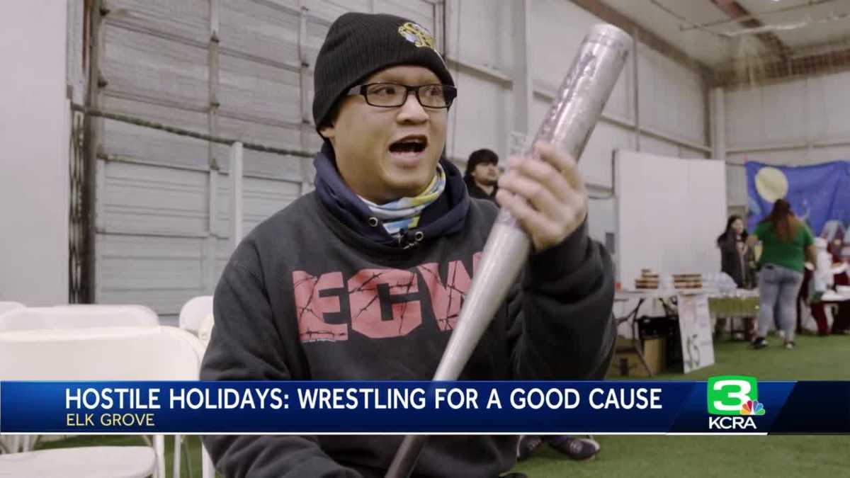 Pro wrestlers put on show with a giving spirit and heavy hearts
