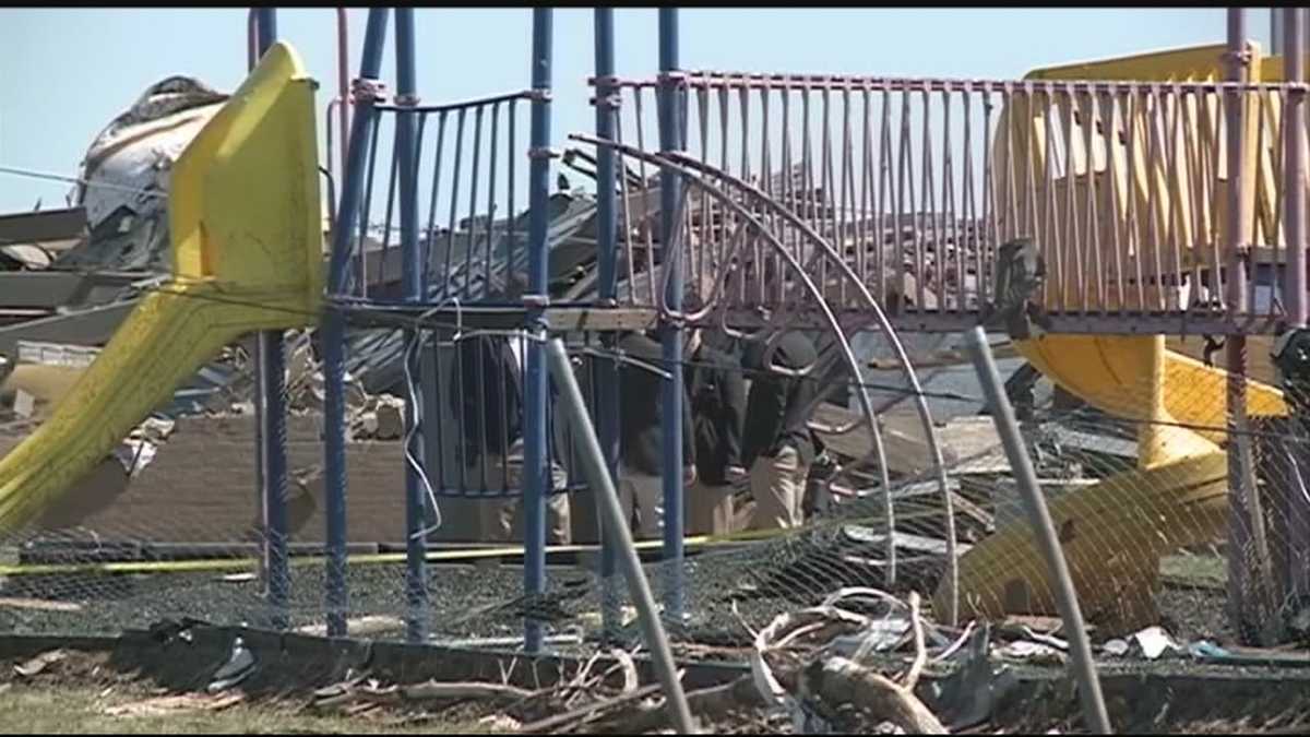 Mother, children survive tornado under mattress