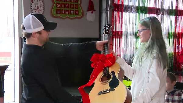 iowa nonprofit gifts guitars to young musicians