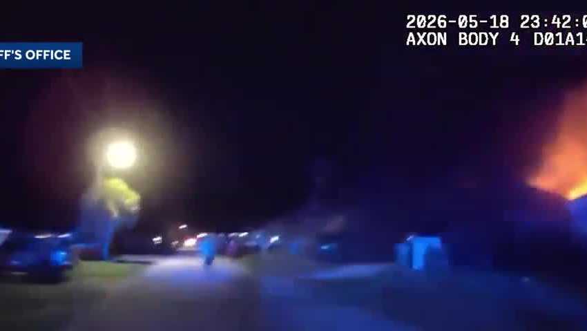 Video: Deputy rushes into burning home, rescues people inside