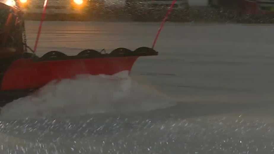 Snow piles up on roads, crews work to keep streets clear