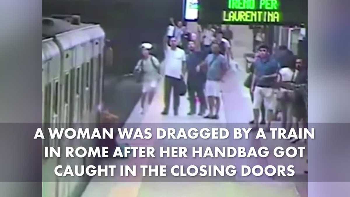 Woman dragged by train after getting bag caught in door