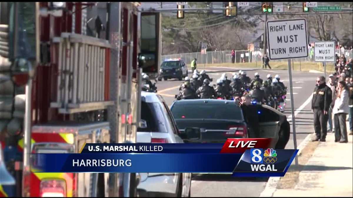 Dozens of law enforcement officers escort Christopher Hill's funeral