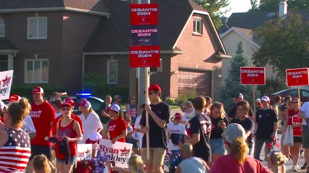 GOP presidential hopefuls walk in West Des Moines holiday parade