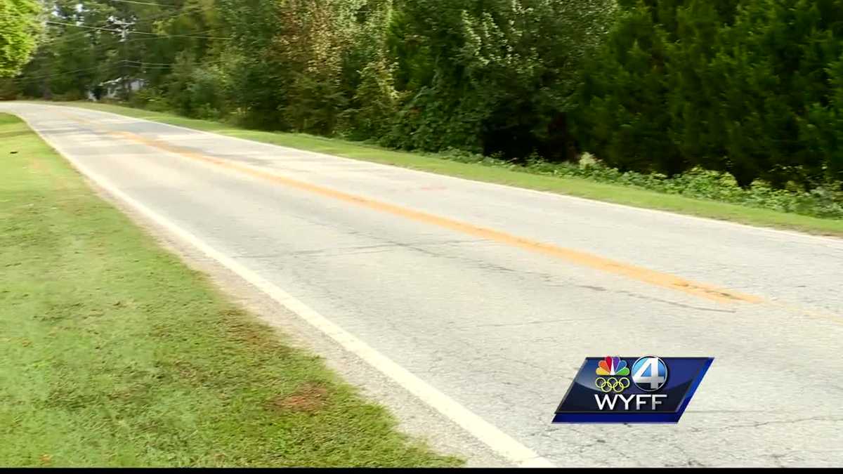 Woman hit by truck, killed near her home, coroner says
