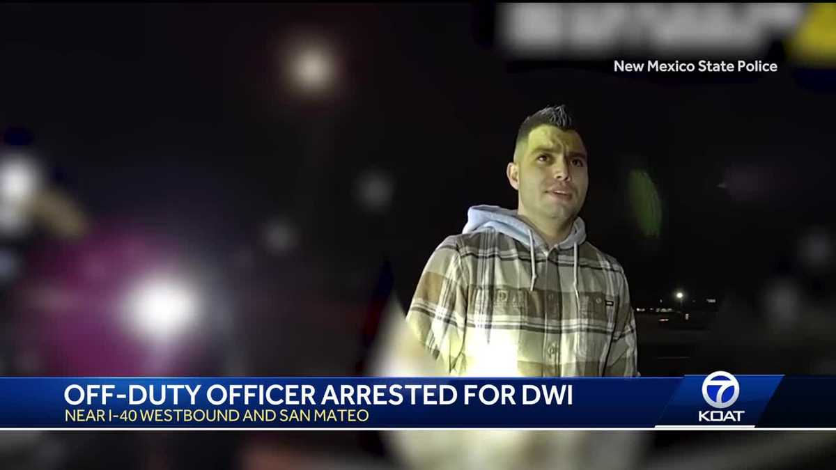 new mexico state police officer arrested