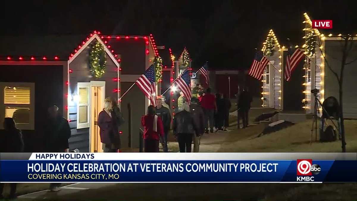 Veterans tiny homes village decorated with holiday lights