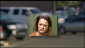 Mother arrested after leaving children in locked car while shopping