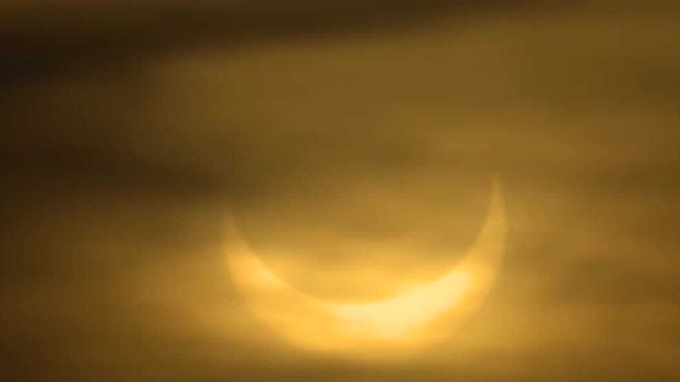 Partial solar eclipse delights morning skywatchers