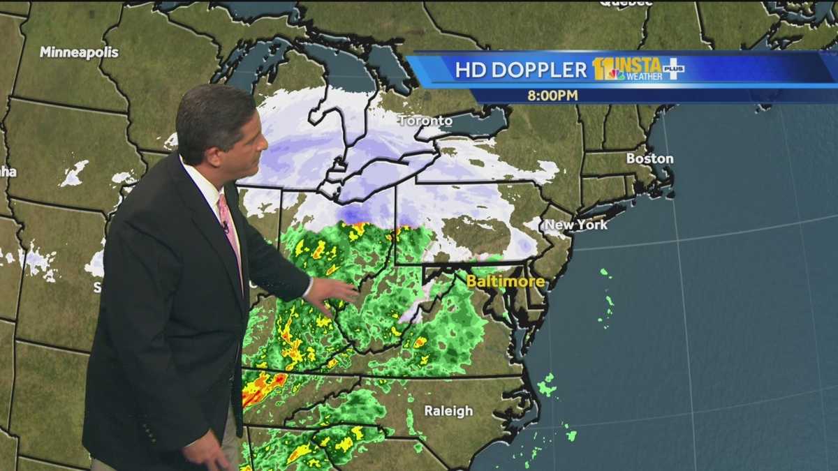 Snow falls in Maryland as storm passes through