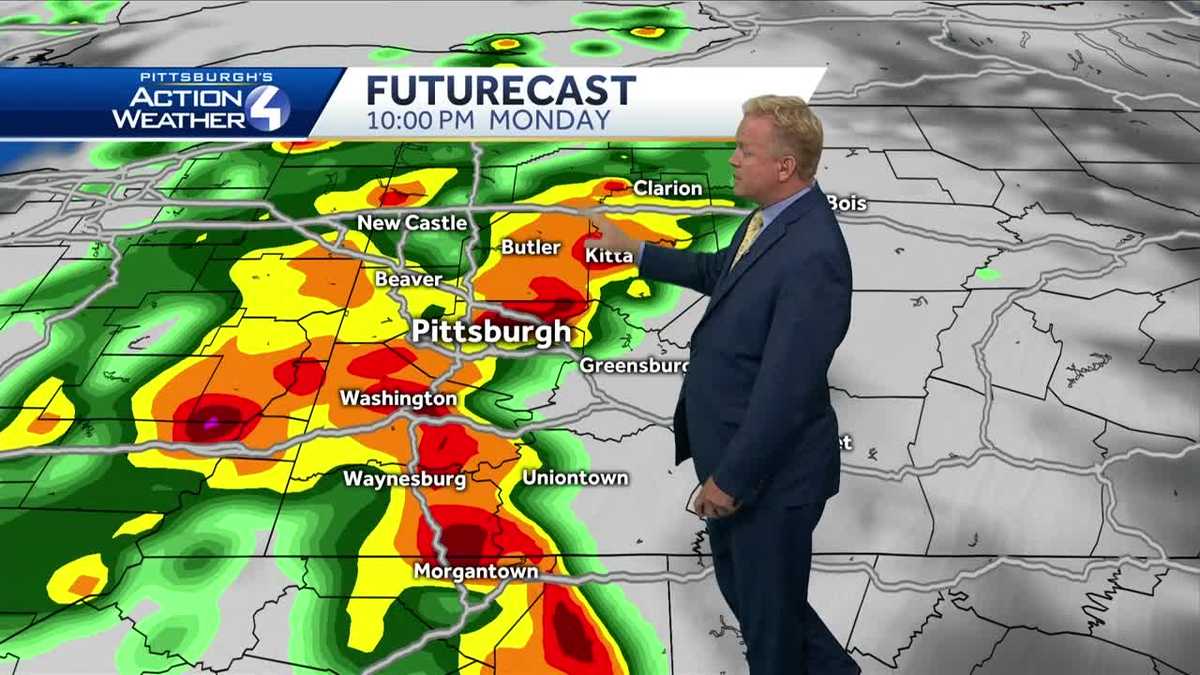 Scattered rain showers, breezy conditions Tuesday