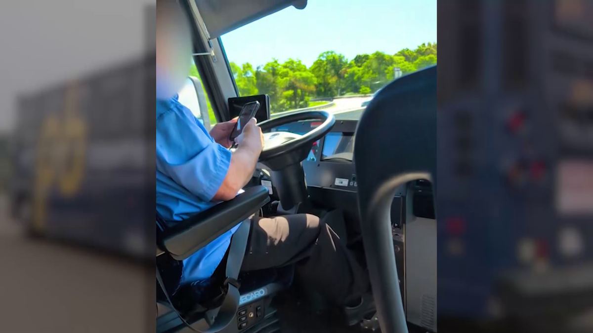 Video appears to show bus driver using cellphone on Mass. highway