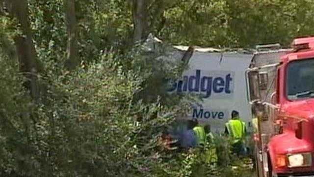 Truck hits tree, kills 3