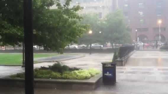 Rain pounds downtown